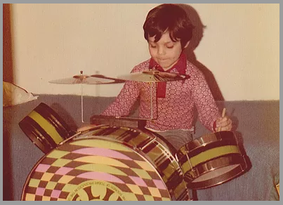 kid playing drums